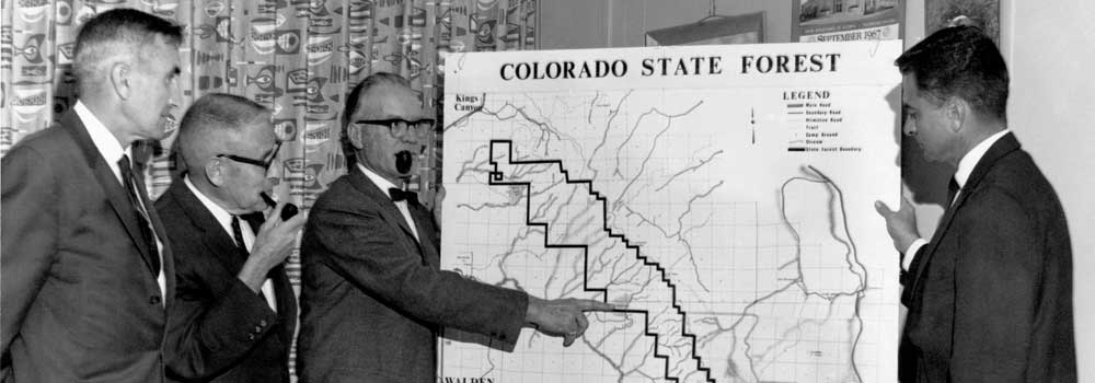 1967 - State Land Board officials and State Forester Tom Borden discuss the Colorado State Forest