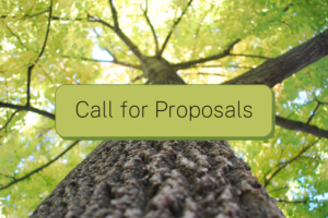 view of tree canopy looking up from bottom with text call for proposals on a button in the middle.