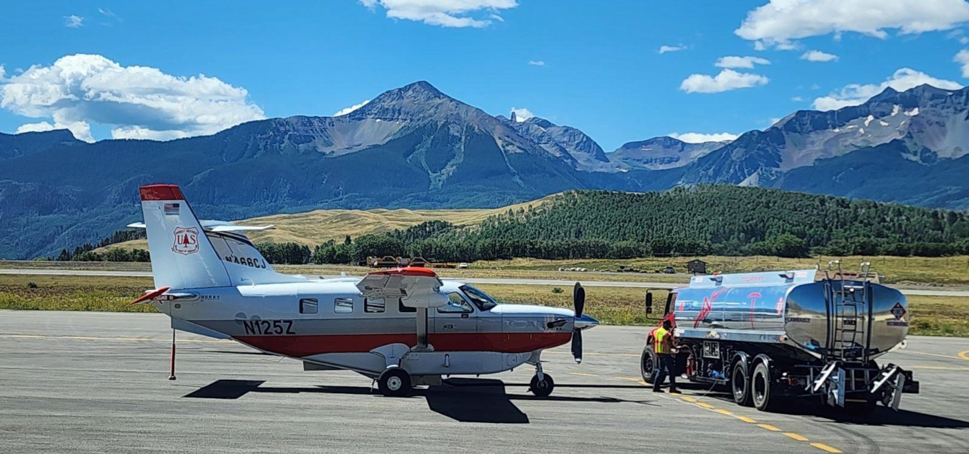 The aerial survey crew fuels its aircraft in Telluride before surveying insect and disease damage to forests.