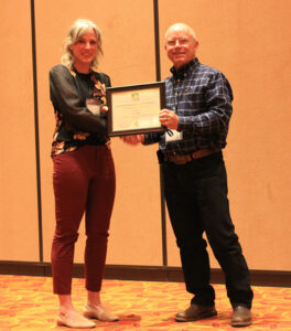 Amy Bulger receives award at Society of American Foresters banquet.