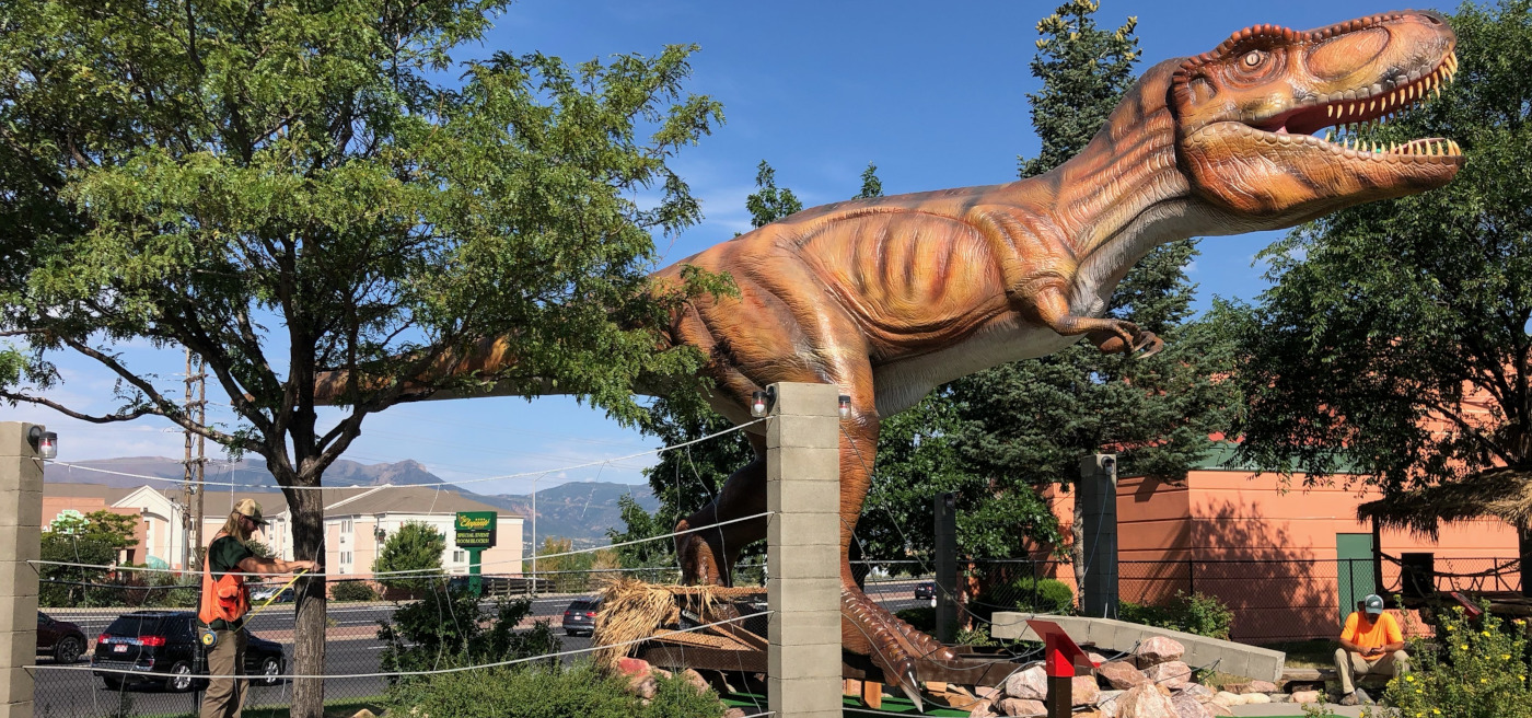 Colorado FIA crew members measuring trees in a mini-golf facility